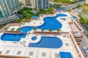 Waikiki Landmark luxury condominium swimming pool with resort-style design in Honolulu